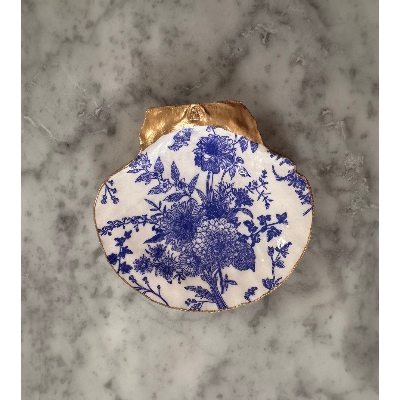 Detailed view of blue chinoiserie floral shell trinket dish