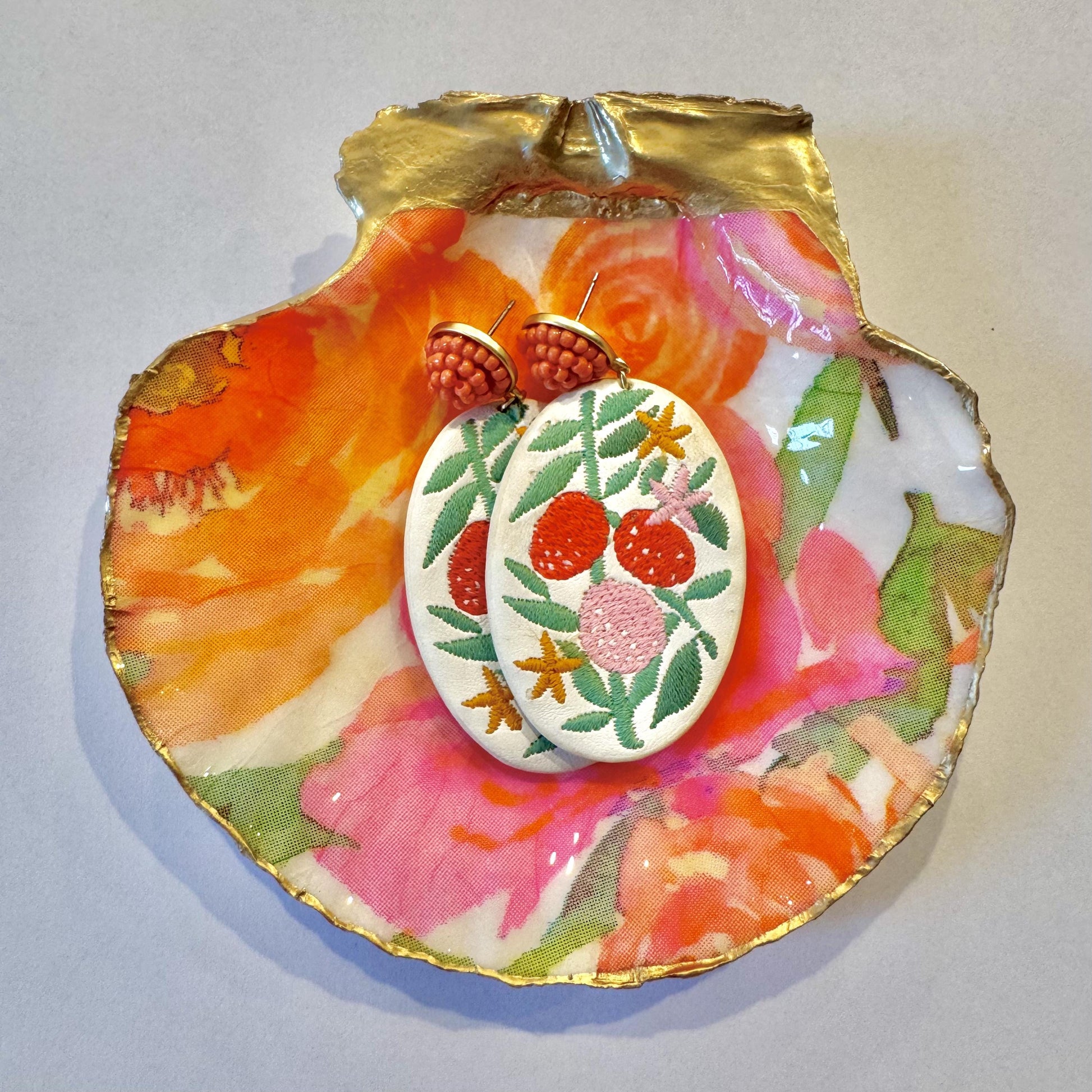 Detailed view of pink spring blossom shell trinket dish