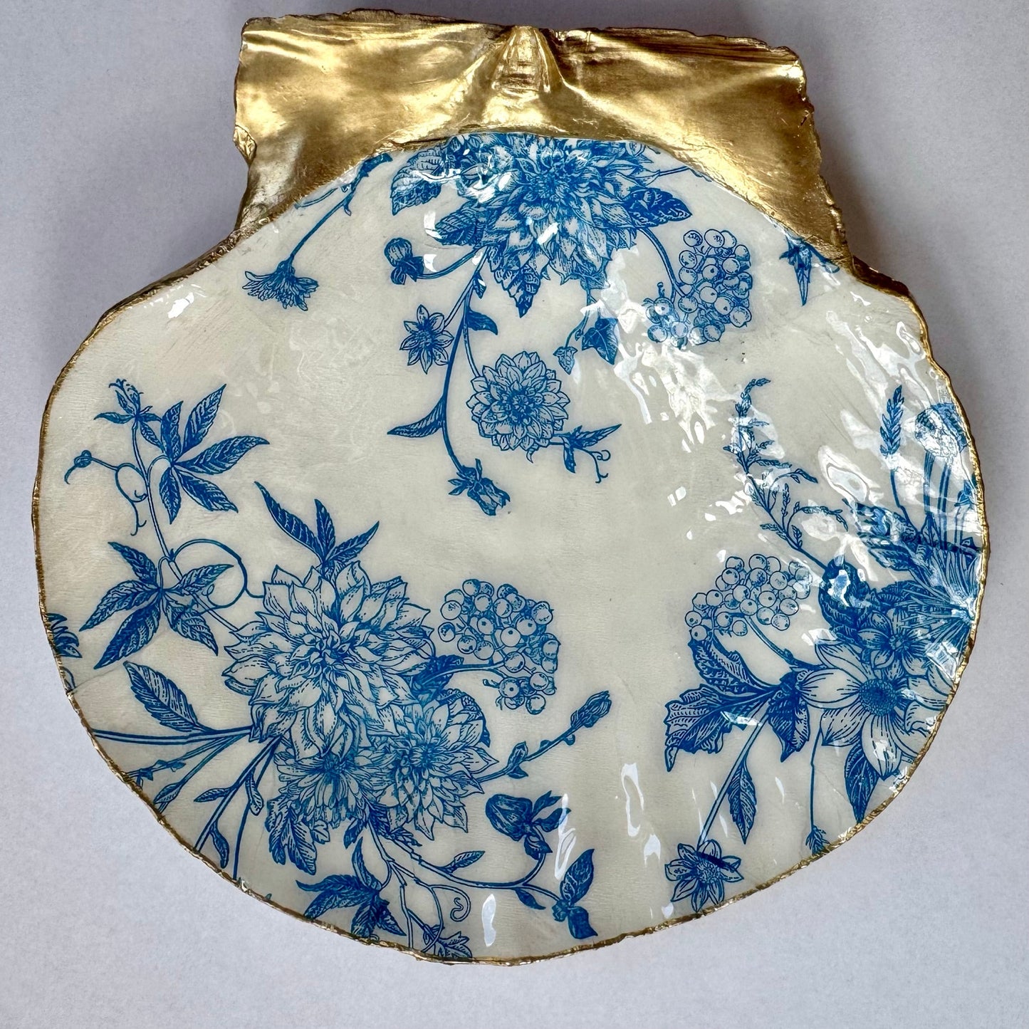 Detailed view of blue toile botanical shell trinket dish