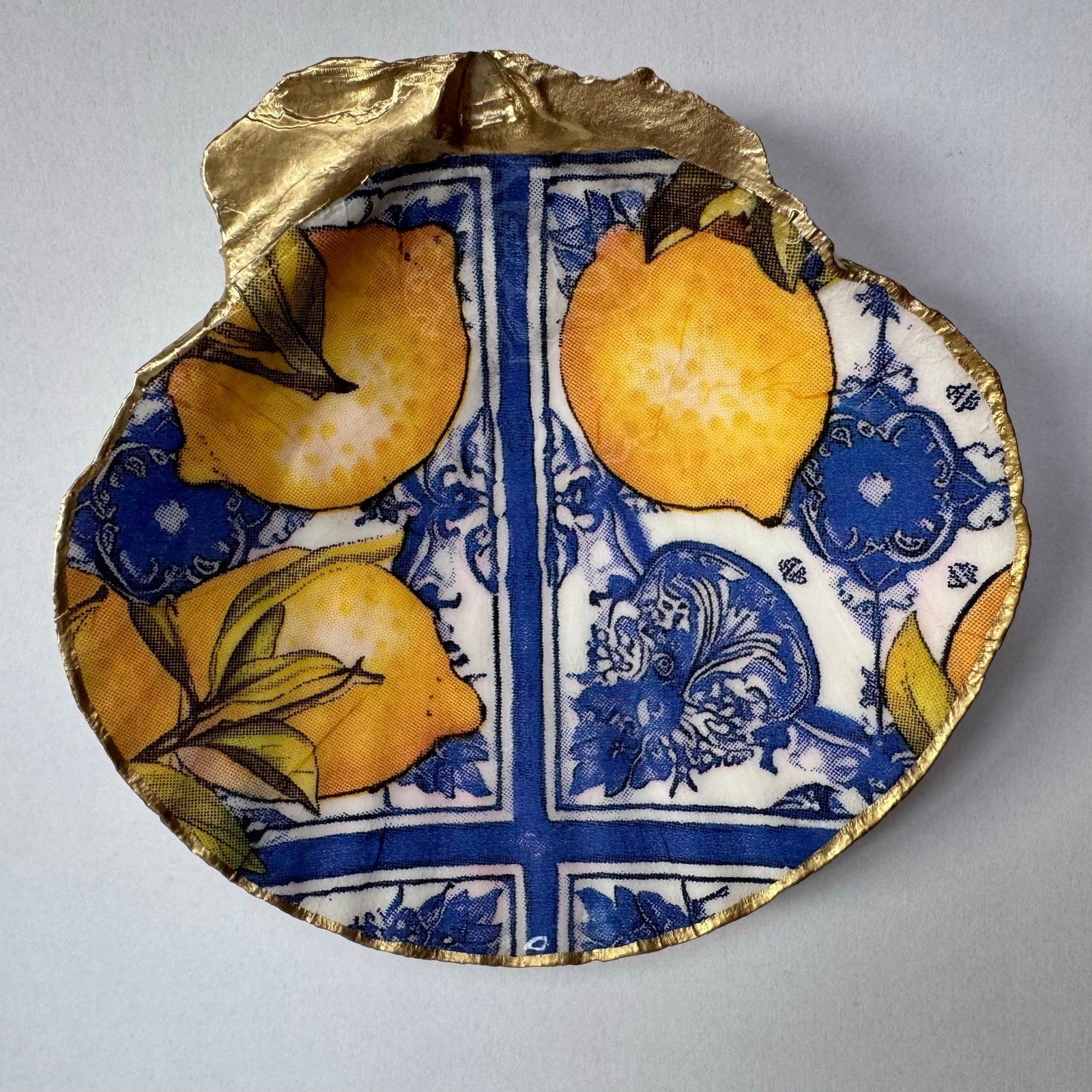 Detailed view of blue mediterranean lemon tile shell trinket dish